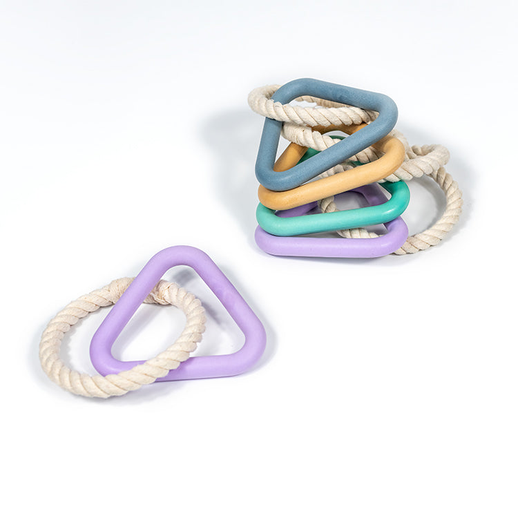 The perfect toy to play with your dog while both of you engage and are entertained. The Woof Triangle The triangle is made of natural rubber with a reinforced core for added strength. The rope is natural cotton. Grab the matching Woof collection (collar, leash and poop bag carrier) to complete your set.