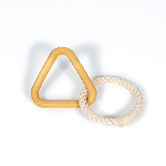 The perfect toy to play with your dog while both of you engage and are entertained. The Woof Triangle The triangle is made of natural rubber with a reinforced core for added strength. The rope is natural cotton. Grab the matching Woof collection (collar, leash and poop bag carrier) to complete your set.
