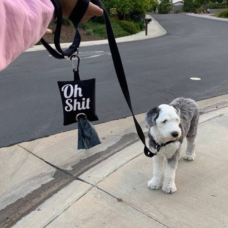 This pouch makes the hard part of your walks in the park more fun. Say goodbye to your cracked, plastic bag holder, and swap it out with this Oh Shit! Poop Bag / Pouch. The pouch can hold two standard size rolls of bags or one roll of bags and some treats or other smallish items.