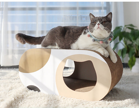 This unique and spacious tunnel scratching board will keep your cat entertained and off your furniture. Its cat climbing frame is crafted out of safe and environment-friendly material, durable and well designed. Apart from scratching cats treat this tunnel as a lounger to lie on it making this product perfect to lounge, hide and play.  